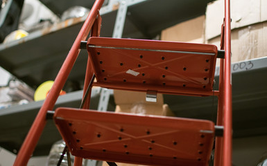 Stepladders in the warehouse.