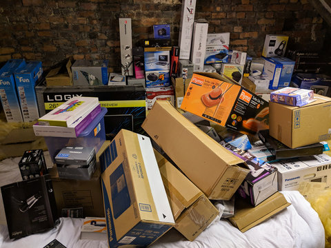 Various Appliance And Product Boxes Stored In Home Attic.