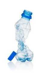 Crumpled blue plastic bottle isolated on white background