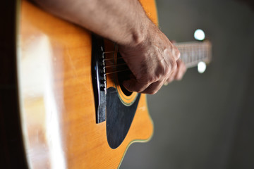 hand with a guitar