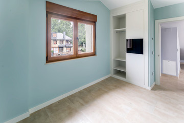New beautiful empty bedroom with large window. Interior modern room.