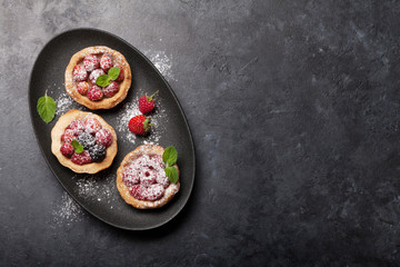 Set of cakes with berries