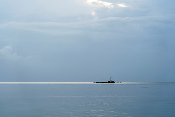 Blue sky with clouds over sea water. Nature composition.