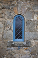 Blue Old Window and Stone Wall