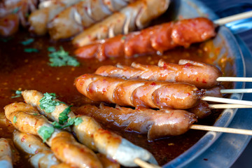 Fried food with sticks, Thai style food, Street food in Bangkok, Thailand