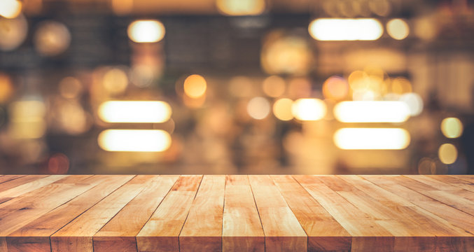 Wood Texture Table Top (counter Bar) With Blur Light Gold Bokeh In Cafe,restaurant Background