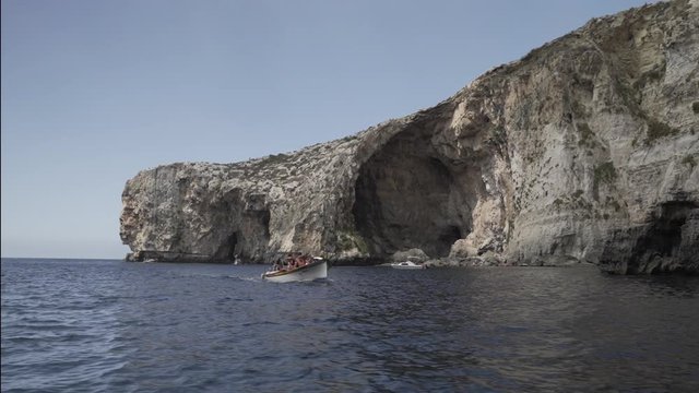 Boat ride across Mediterranean Sea Caves & Coastal Cliffs - Blue Grotto, Malta