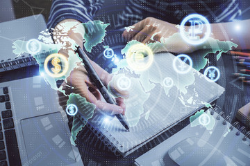 Financial chart drawn over hands taking notes background. Concept of research. Double exposure