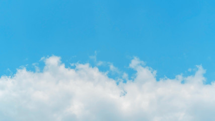 White cloud on a blue sky for a background.