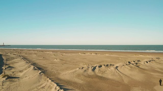 Dunkirk beach, ocean, lighthouse and factories (Dunkerque, France)