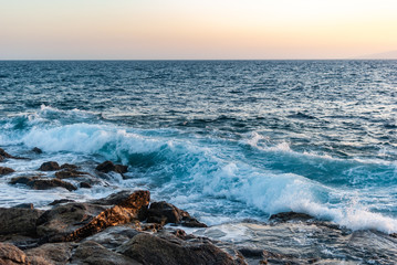 waves cover a stone coast