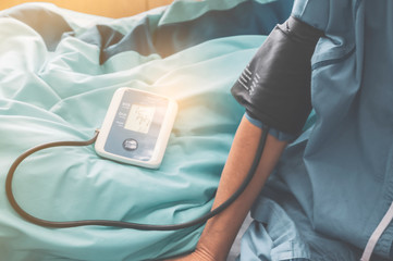 Asian seniors check the pressure in the hospital.