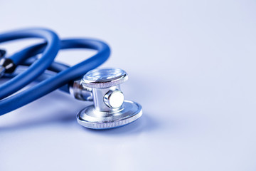 Medical concept image. Stethoscope on white background close up.A lot copy space around the product.Blue stethoscope.Healthcare.