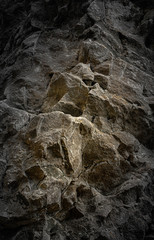 Steep rocky cliff with warm accent