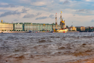 Russia. Saint Petersburg. Winter Palace. Canals of St. Petersburg. Sailing ship in the center of St. Petersburg. River Tours on the Neva. Maritime festival. Marine parade. Travels to Western Russia.