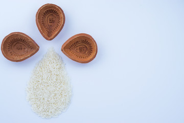 Indian festival Diwali, Diya oil lamps lit on colorful rangoli. Hindu traditional. Happy Deepavali.