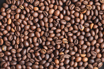 Texture of roasted coffee beans. Horizontal photography