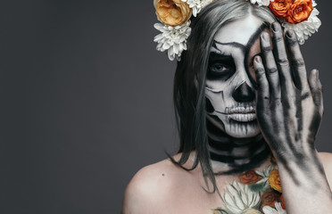 Female with traditional spooky makeup on Halloween