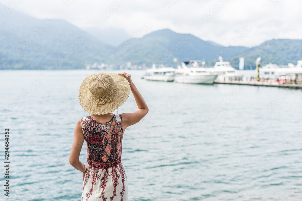 Poster traveling asian woman with hat