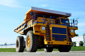 Giant mining dump truck, after being discharged from the conveyor, is tested at the factory test site. Heavy-duty truck manufacture by the heavy vehicle plant.