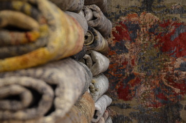 A fragment of multicolor knitted woolen carpets, useful as a backdrop for your design work.