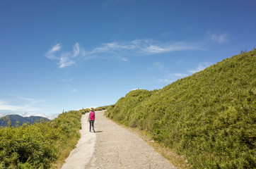 Asian mountain climbing woman walking