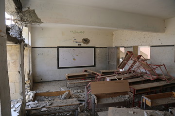 The effects of missiles and destruction on schools in Taiz City,Yemen .