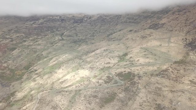 Range of peaky mountains in sunshine