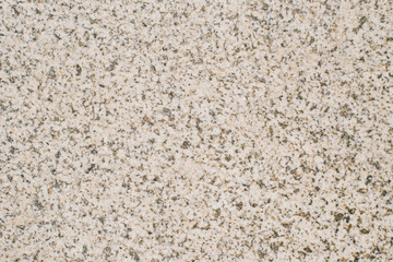 Light beige granite, granite chips background