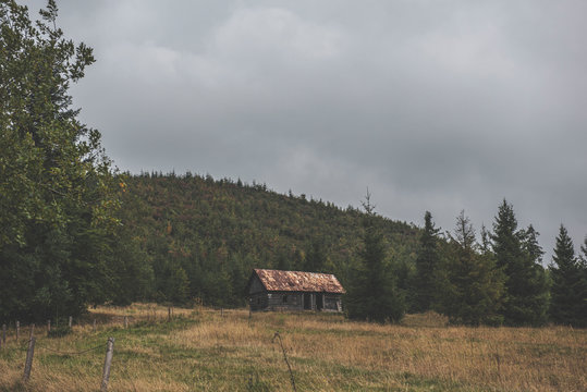 old barn in a field