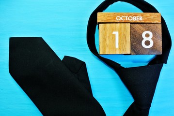 Wooden calendar on October 18,International Necktie Day.