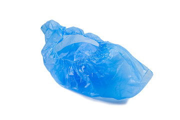 Fototapeta premium disposable blue shoe covers for hospital visits isolated on white background