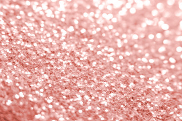 Pink glitter texture Festive sparkling sequins background closeup. Wpaper for Valentine, New Year or Christmas Holidays.