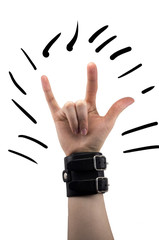 hand with leather rocker bracelet with rock and roll sign, rock music isolated on white background
