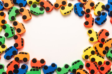 mini toy rubber cars on white background