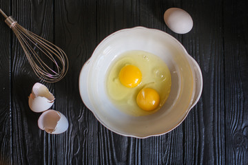 dough liquid, raw ingredients (eggs, flour, sugar, salt and more) menu concept. food background. copy space. Top view