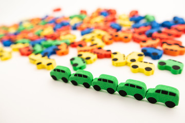 mini toy rubber cars on white background