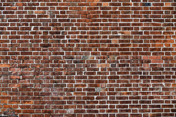 Old Red Brick Wall with Lots of Texture and Color.