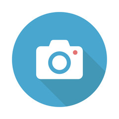 Camera isolated vector icon on circle blue background with shadow. Photo camera icon vector photography sign. Video camera vector icon. Flat design.