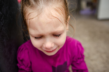 The little girl the child is very scared and because of this cries loudly. Children violence and...