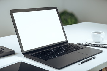 Empty white laptop closeup