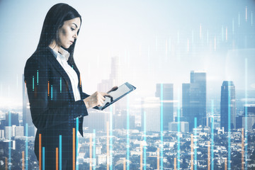 Pretty businesswoman in forex city