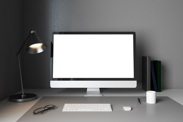 Modern designer desktop with empty computer