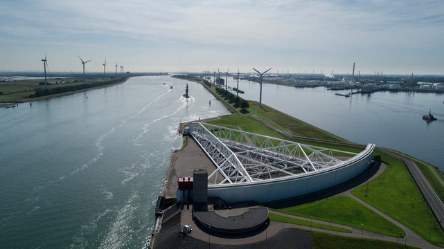 Aerial picture of Maeslantkering storm surge barrier on the Nieuwe Waterweg Netherlands it closes if the city of Rotterdam is threatened by floods and is one of largest moving structures on earth