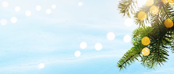 Christmas background. Xmas tree with garland lights holiday decoration, snowy holiday festive...