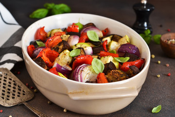 Oven Roasted Vegetables: zucchini, eggplant, tomatoes, paprika. Ratatouille is a rustic dish of vegetables.