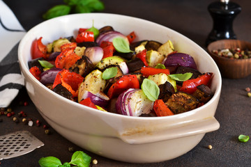Oven Roasted Vegetables: zucchini, eggplant, tomatoes, paprika. Ratatouille is a rustic dish of vegetables.