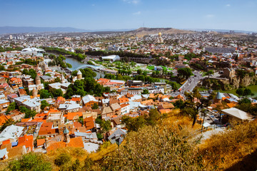 Obraz premium Top view of the city of Tbilisi in Georgia. Near the funicular. Sunny and hot day in September.