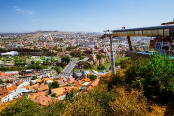 Top view of the city of Tbilisi in Georgia. Near the funicular. Sunny and hot day in September.