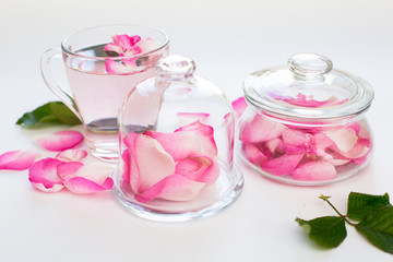 Rose  petals tea in a white background. Horizontal